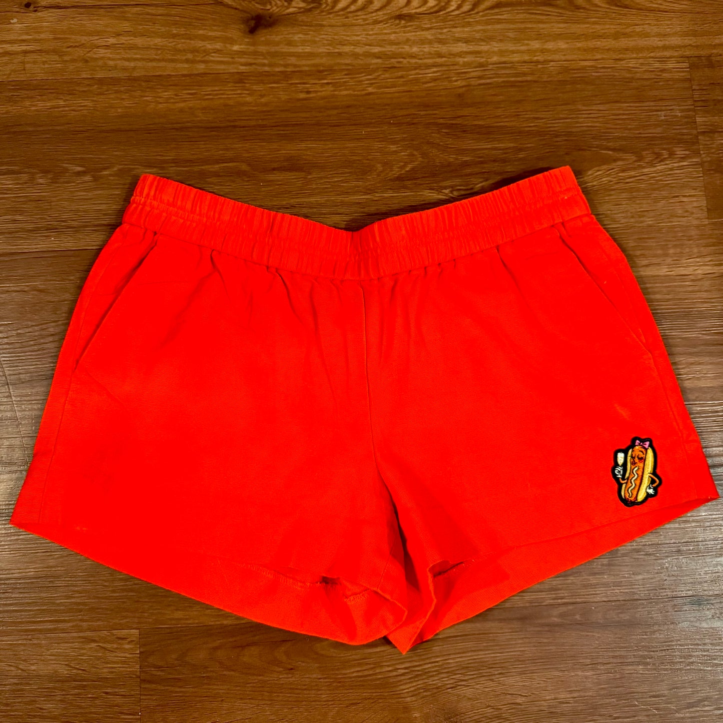 Red Athletic Shorts with Hot Dog Patch